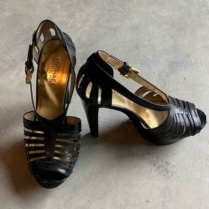 Michael Kors Black Leather Platforms. Size 7.5. Gold hardware. Lightly used.